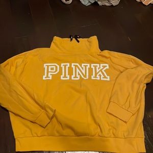 Pink yellow high top crewneck? Idk what to call it lol